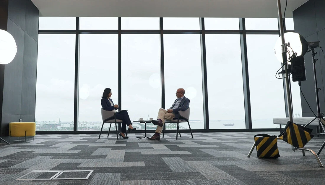 André speaks to Ho Ghim Siew.png